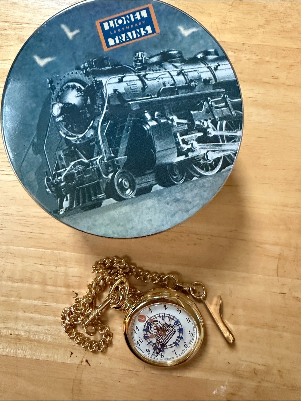 Lionel Gold-Tone Pocket Watch with Chain — Classic Blue Dial Accent
